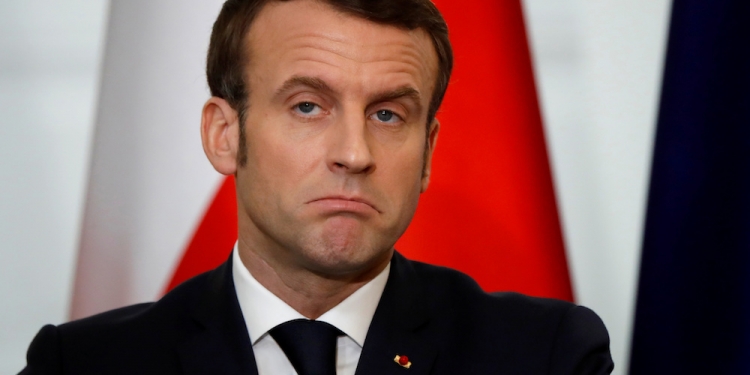 French President Emmanuel Macron reacts during a news conference with Polish President Andrzej Duda, after their meeting in Warsaw, Poland February 3, 2020. REUTERS/Kacper Pempel