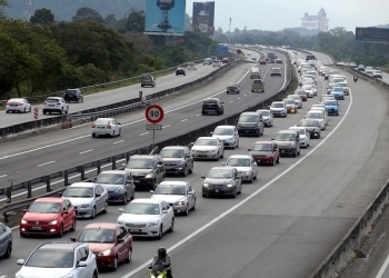 PERAK 18-02-2018.Traffic moving slowly at the North-South Expressway heading to north near Ipoh toll exit following end of a long break after Chinese New Year. MALAY MAIL/Farhan Najib