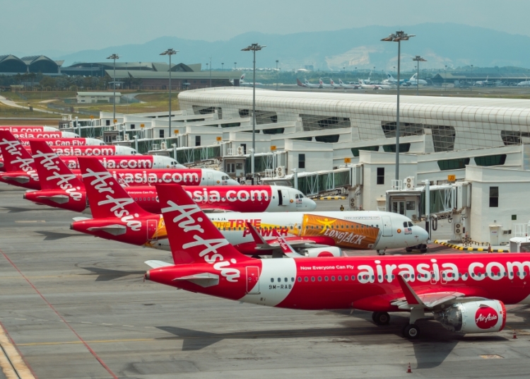 AirAsia: Hand-carry luggage must be stored under the seat to minimise ...