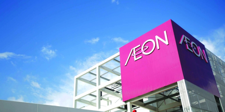 Signage for Aeon Co. is displayed atop the Aeon Mall Makuhari Shintoshin shopping mall, operated by Aeon Mall Co., in Chiba, Japan, on Monday, Dec. 20, 2013.  Photographer: Kiyoshi Ota/Bloomberg