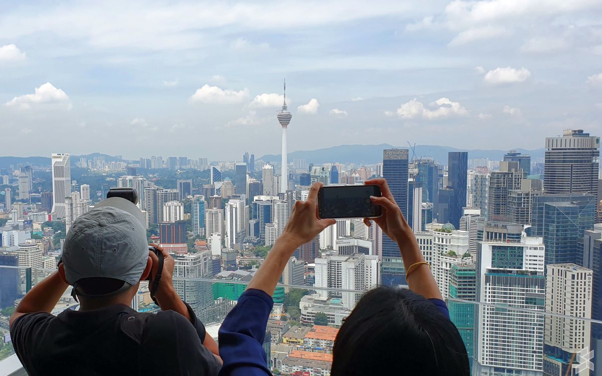 Who actually owns KL Tower and who is Sdn Bhd? SoyaCincau