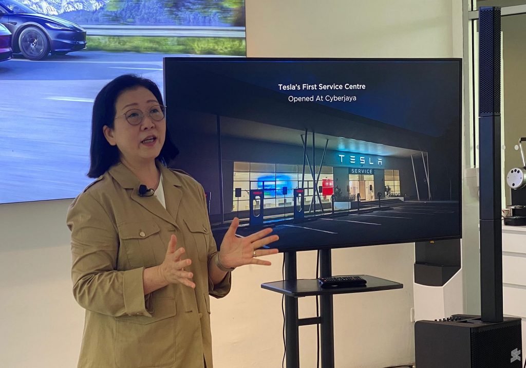 Tesla Regional Director Isabel Fan announcing Tesla Service Centre Cyberjaya