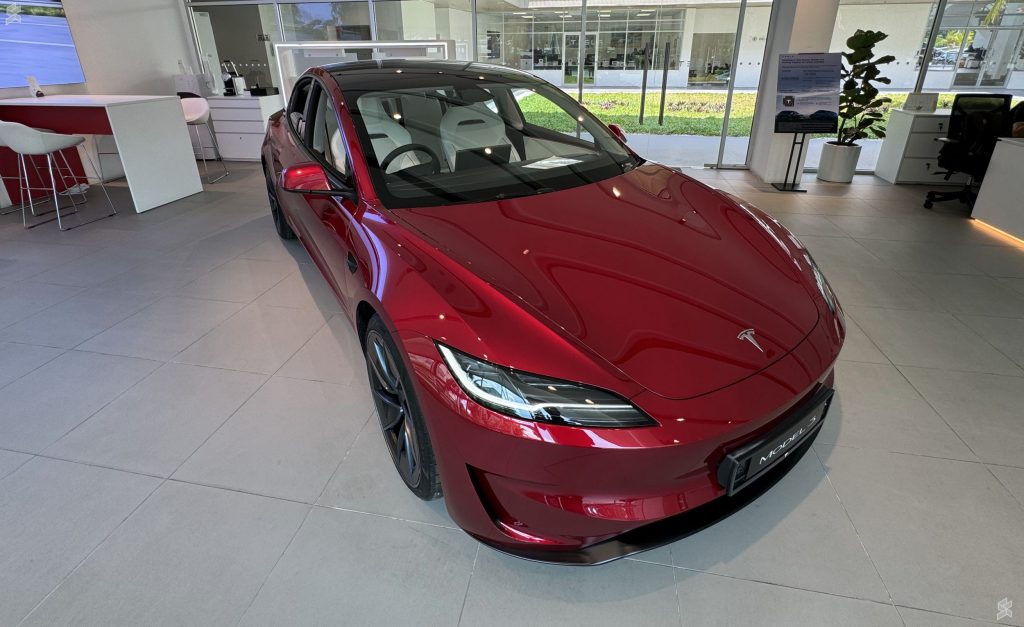 Tesla Model 3 Performance in Ultra Red which is an RM11,000 paint option