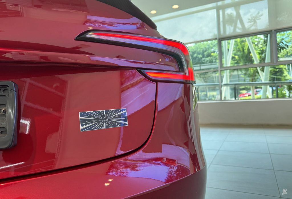 This badge signifies that this is the Tesla Model 3 Performance
