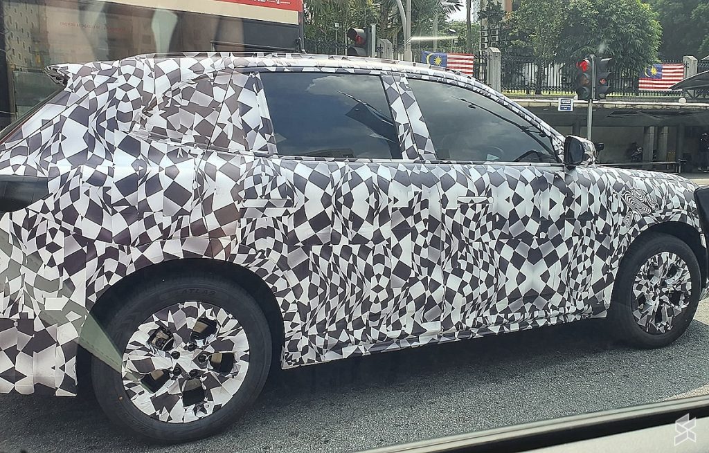 Heavily disguised Proton e.MAS EV goes through Bukit Bintang